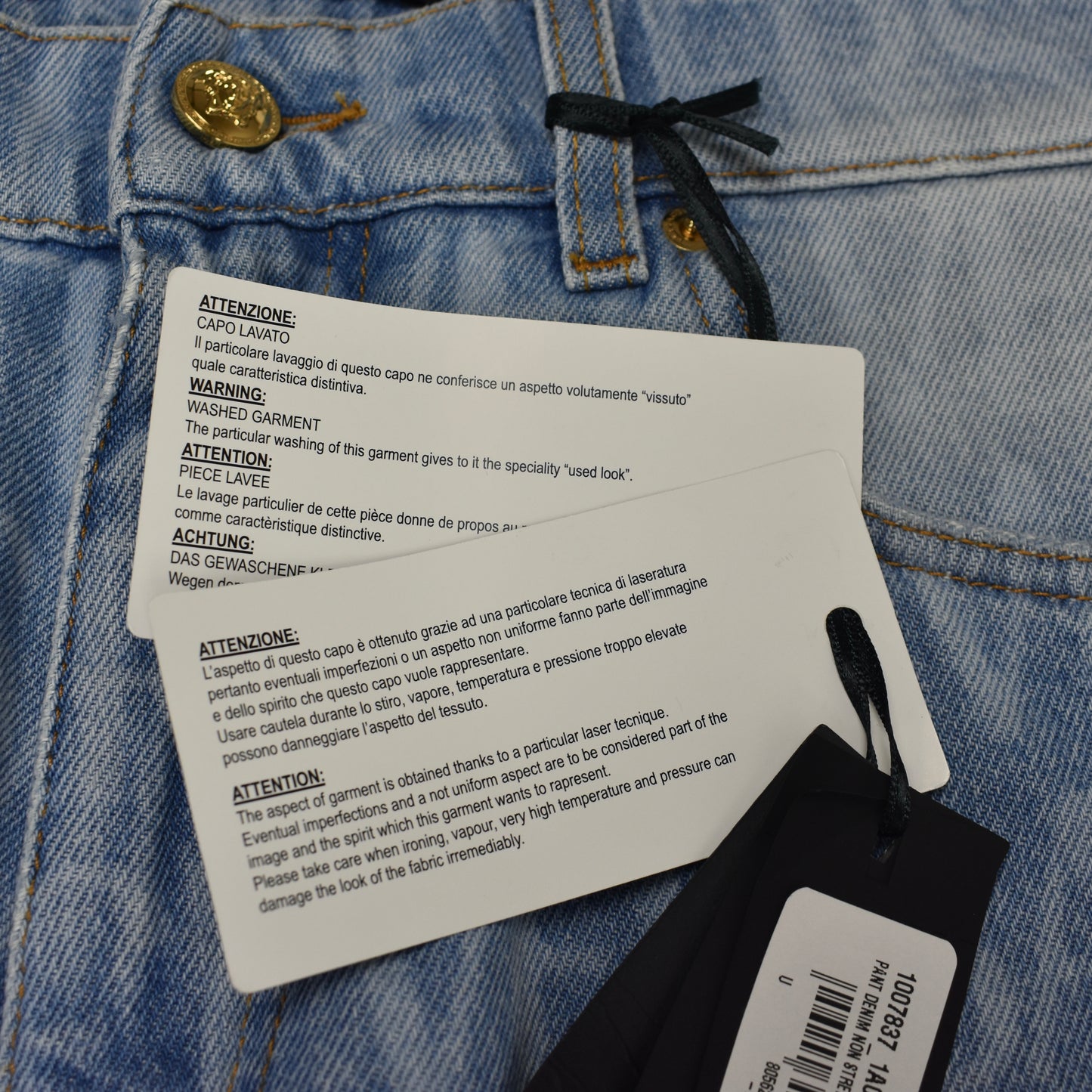 Versace - Allover Logo Print Light Wash Denim Jeans