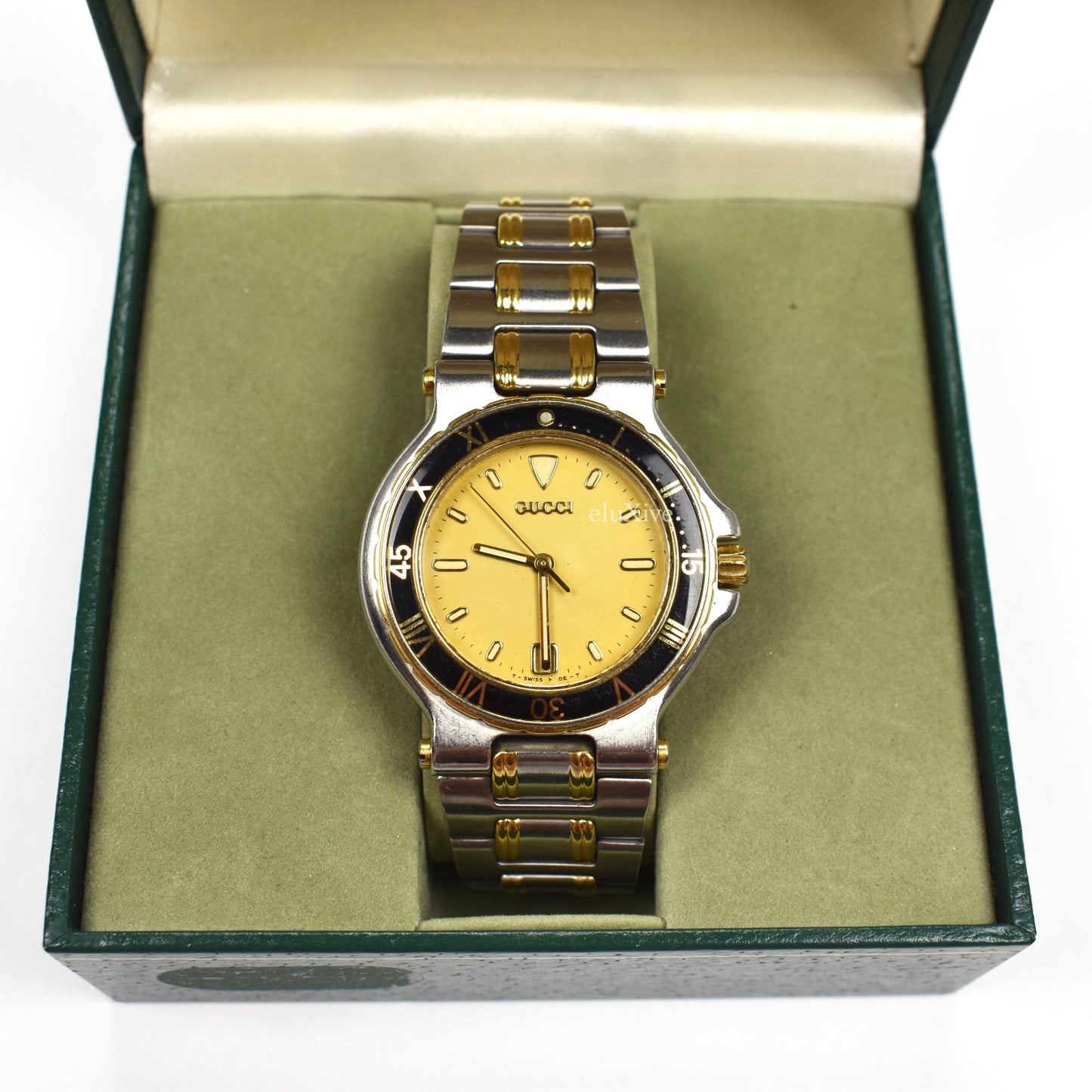 Gucci - 9700M Gold/Steel Black Bezel Watch