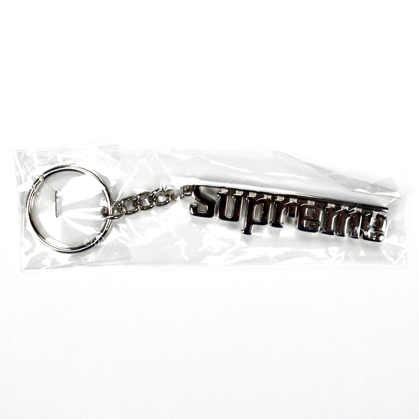 Supreme - Silver Grand Prix Logo Keychain