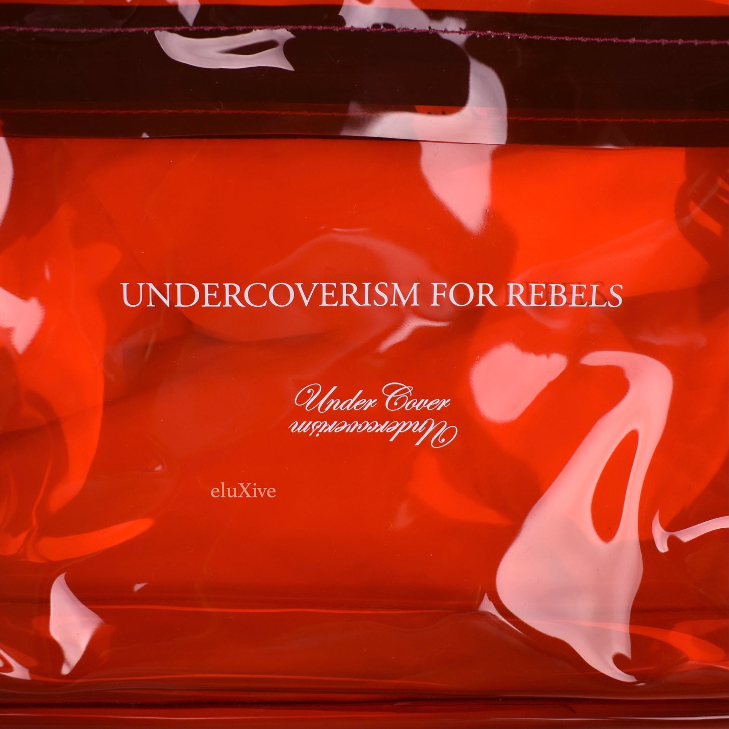 Undercover - Transparent Red PVC Backpack