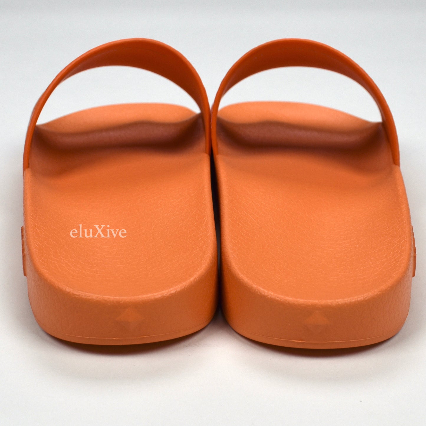 MCM - Persimmon Orange Monogram Logo Slides
