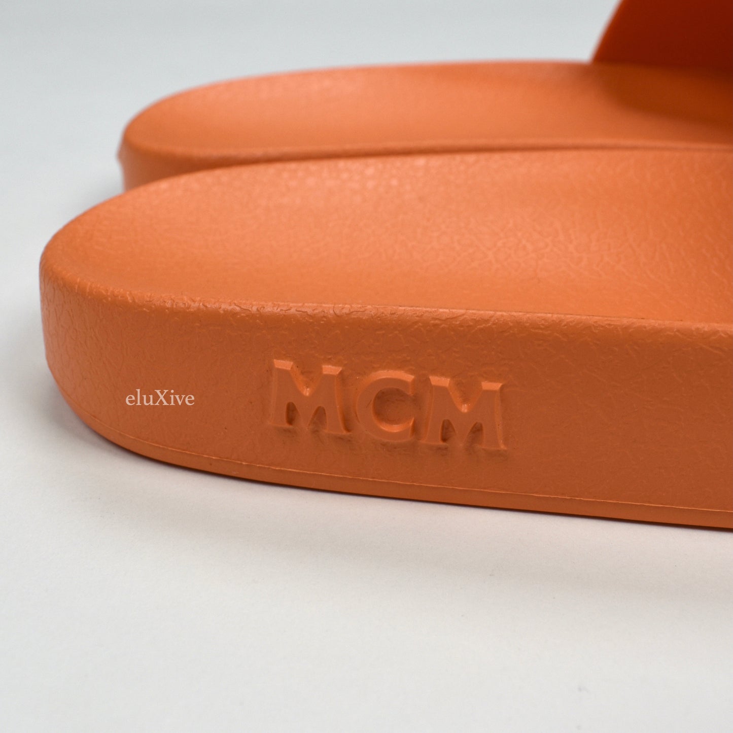 MCM - Persimmon Orange Monogram Logo Slides
