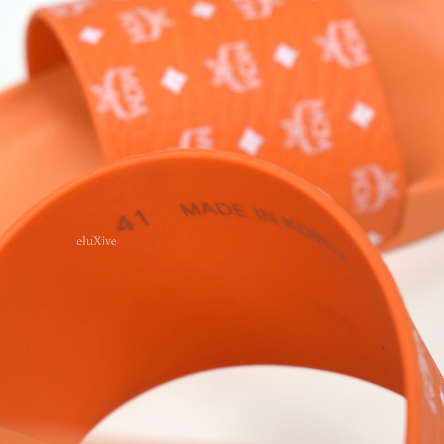 MCM - Persimmon Orange Monogram Logo Slides