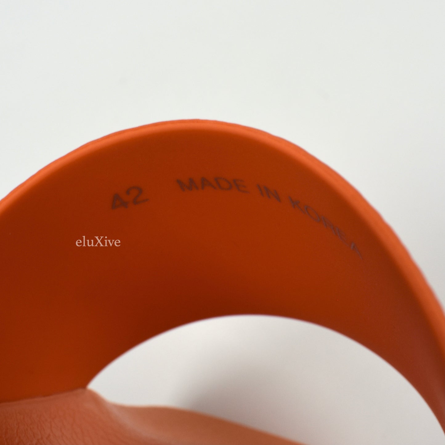 MCM - Persimmon Orange Monogram Logo Slides
