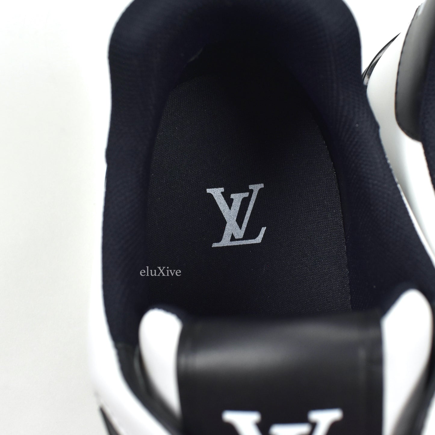 Louis Vuitton - White / Black Leather Trainer Sneakers