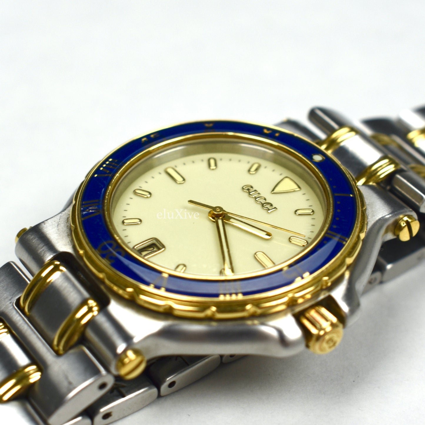 Gucci - 9700M Gold/Steel Blue Bezel Watch
