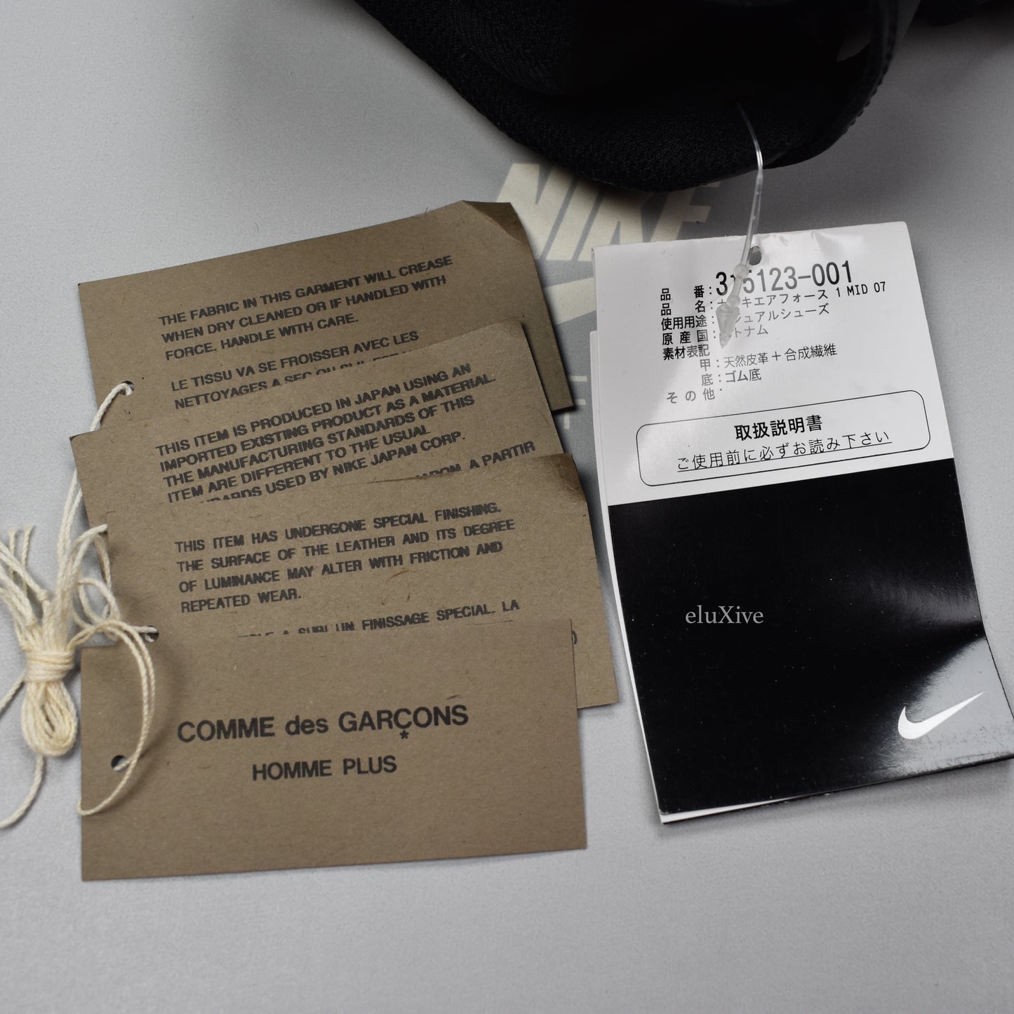 Comme des Garcons x Nike - Air Force 1 Mid 'Dino'