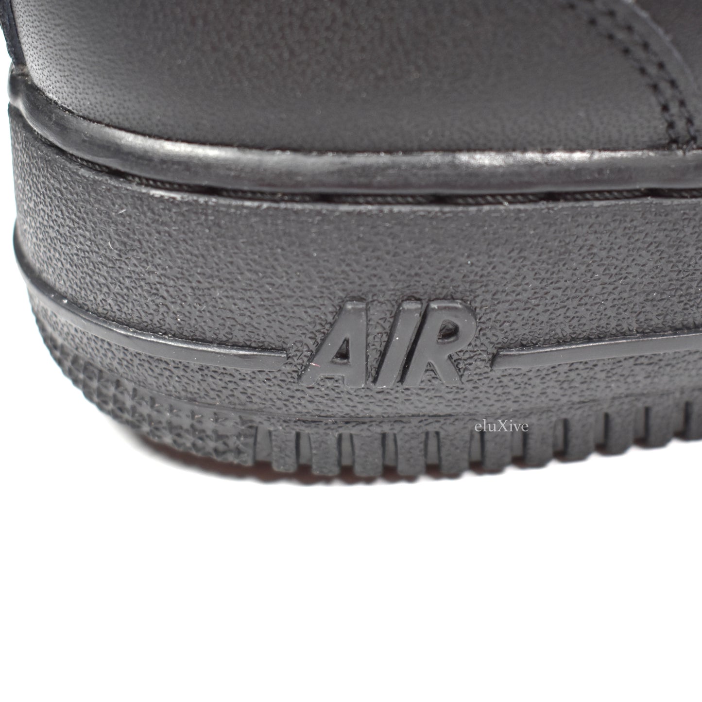 Comme des Garcons x Nike - Air Force 1 Mid 'Dino'