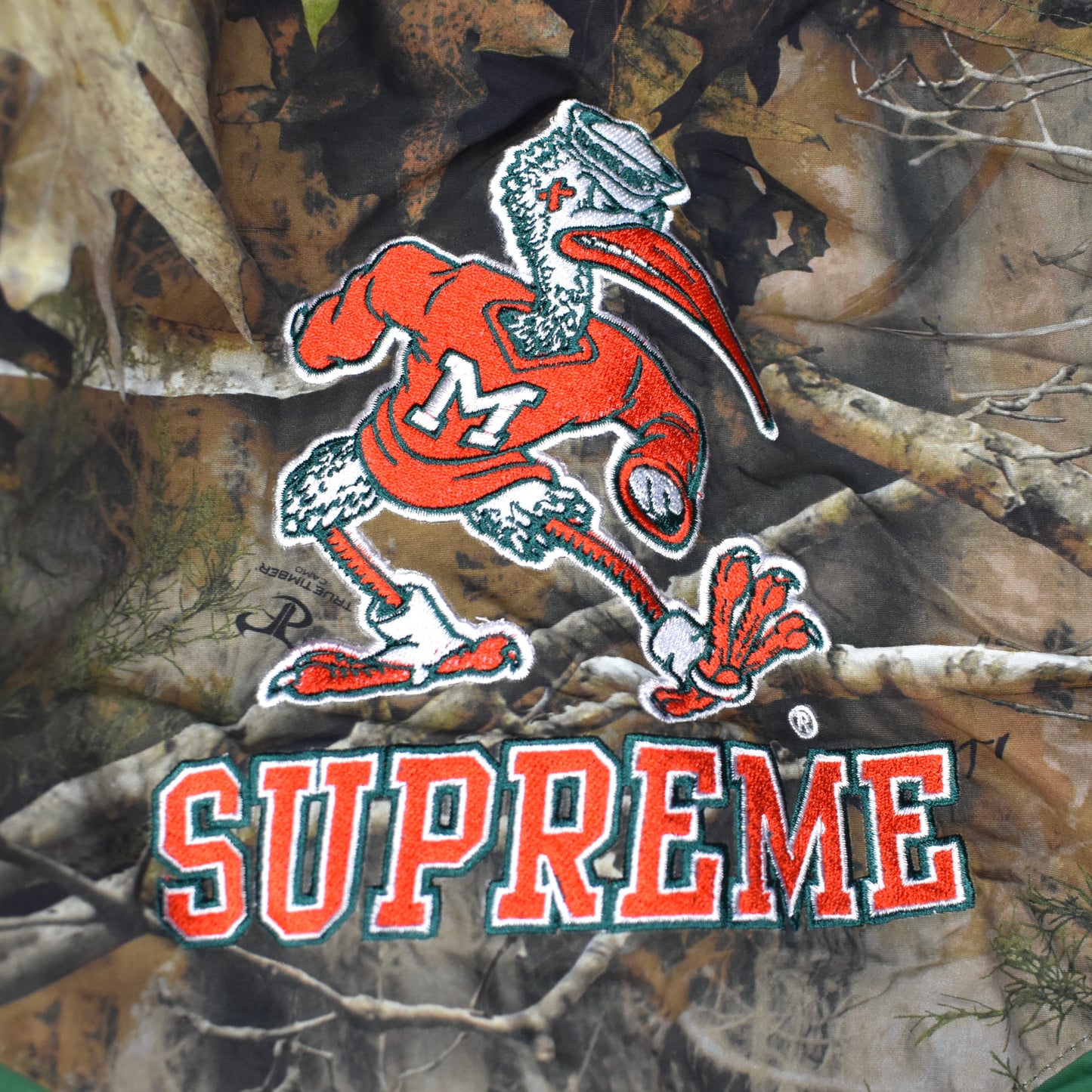 Supreme x Mitchell & Ness x NCAA - Miami Stadium Jacket (Camo)