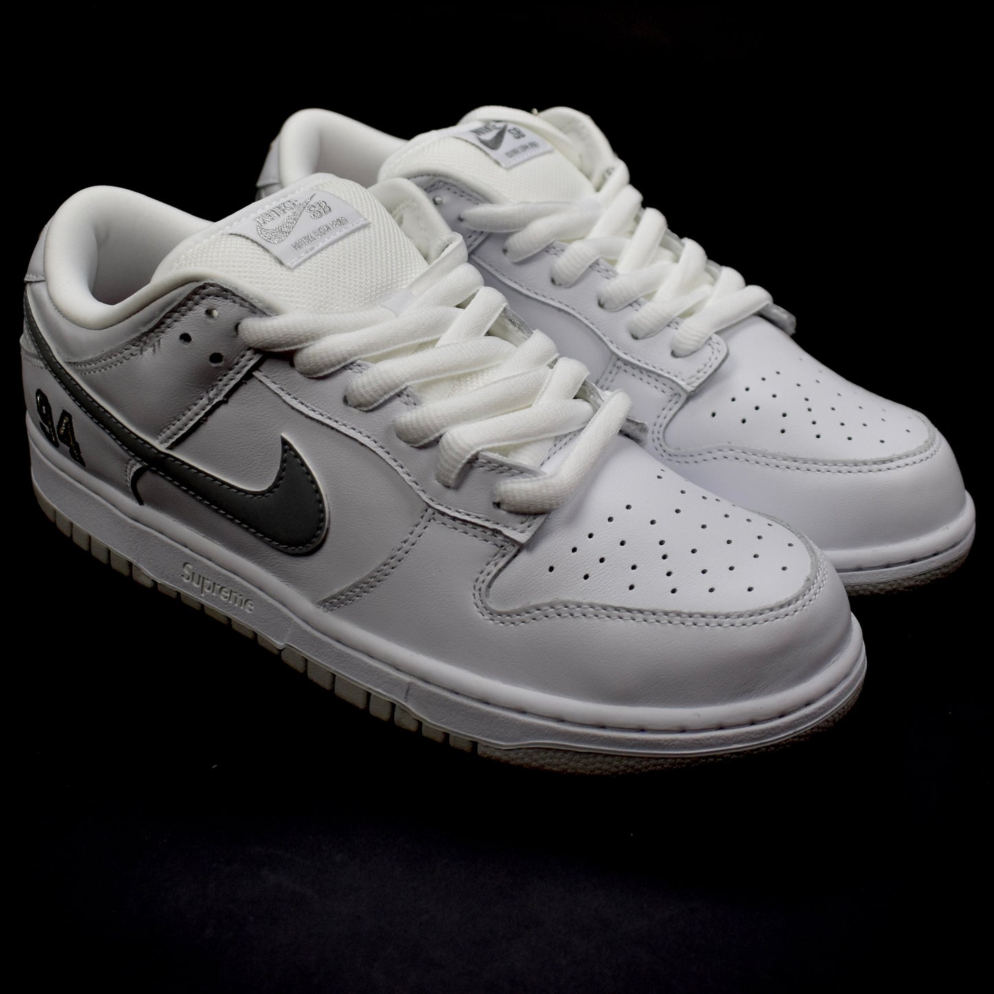 Supreme x Nike - SB Dunk Low OG QS (White/Silver)
