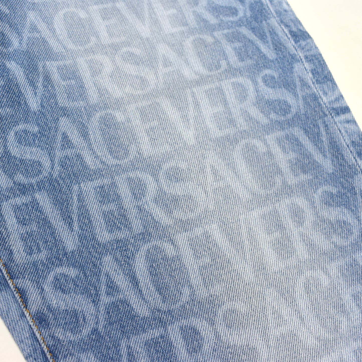 Versace - Allover Logo Print Light Wash Denim Jeans