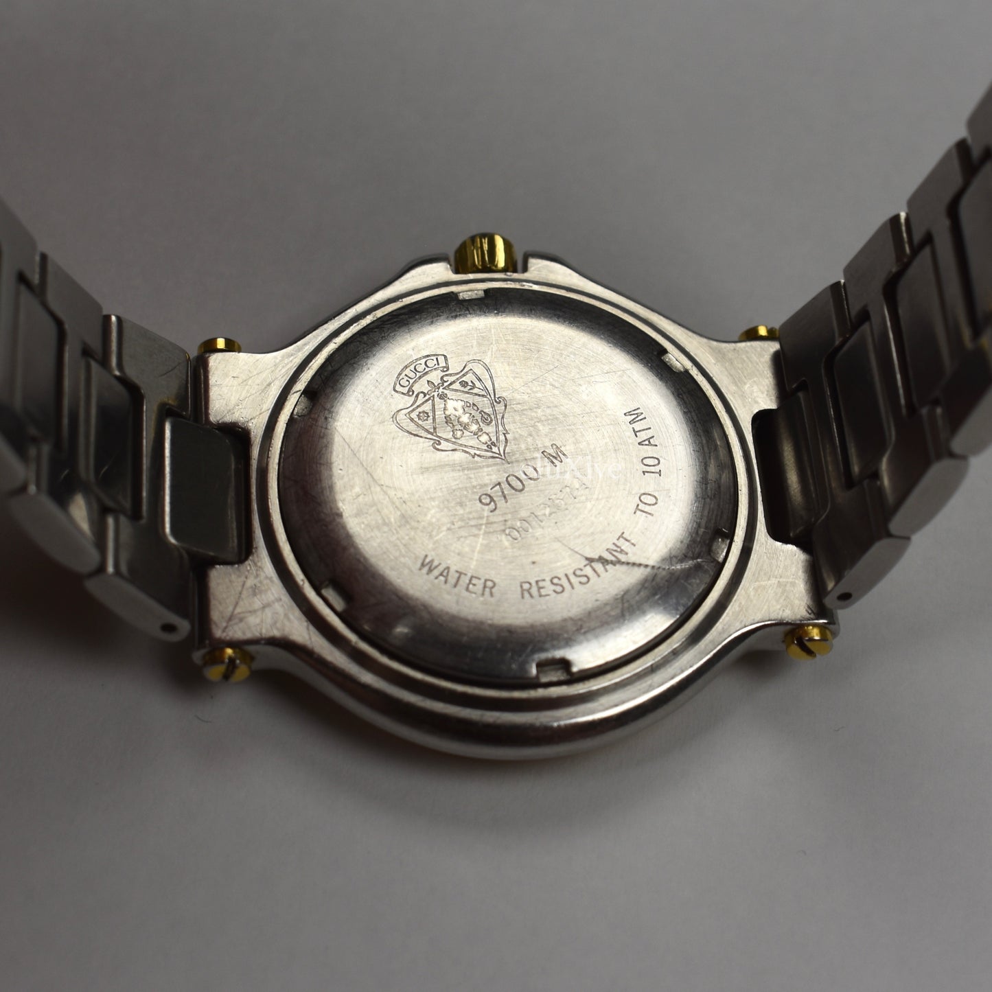 Gucci - 9700M Gold/Steel Black Bezel Watch