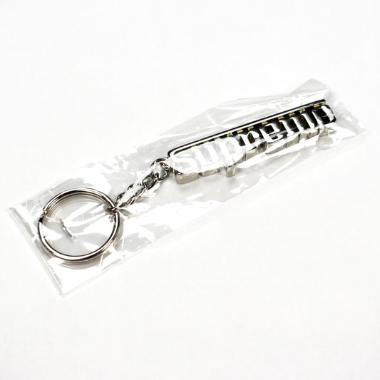 Supreme - Silver Grand Prix Logo Keychain
