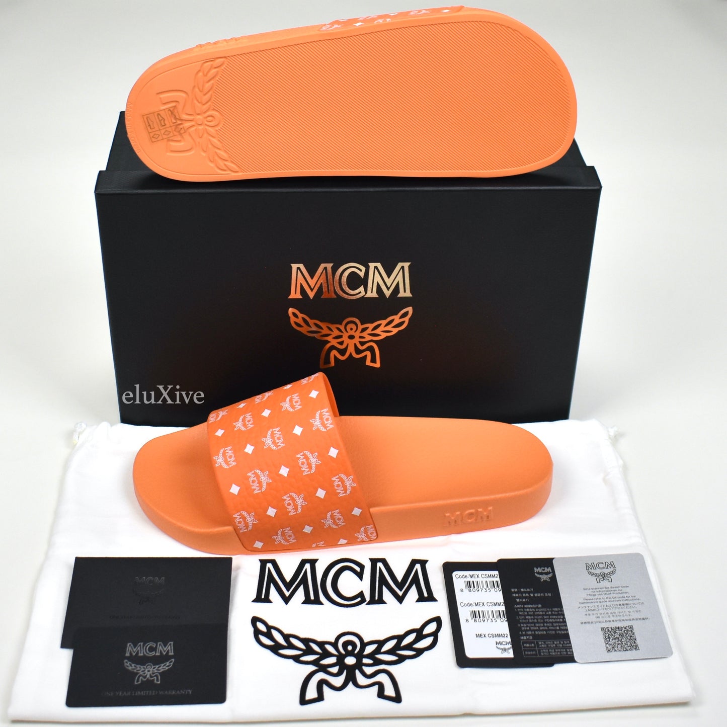 MCM - Persimmon Orange Monogram Logo Slides