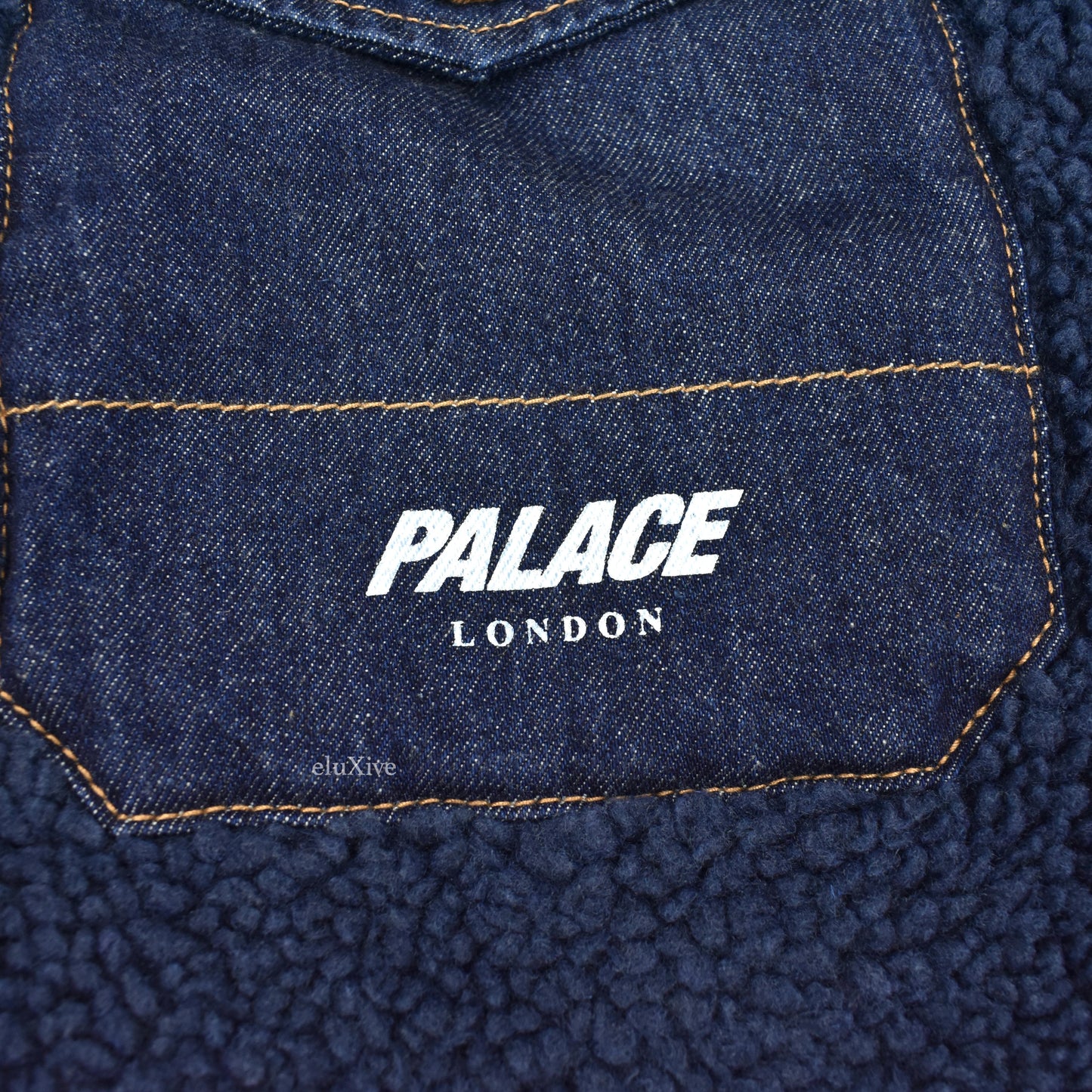 Palace - Navy Grizzly Fleece Denim Trucker Jacket