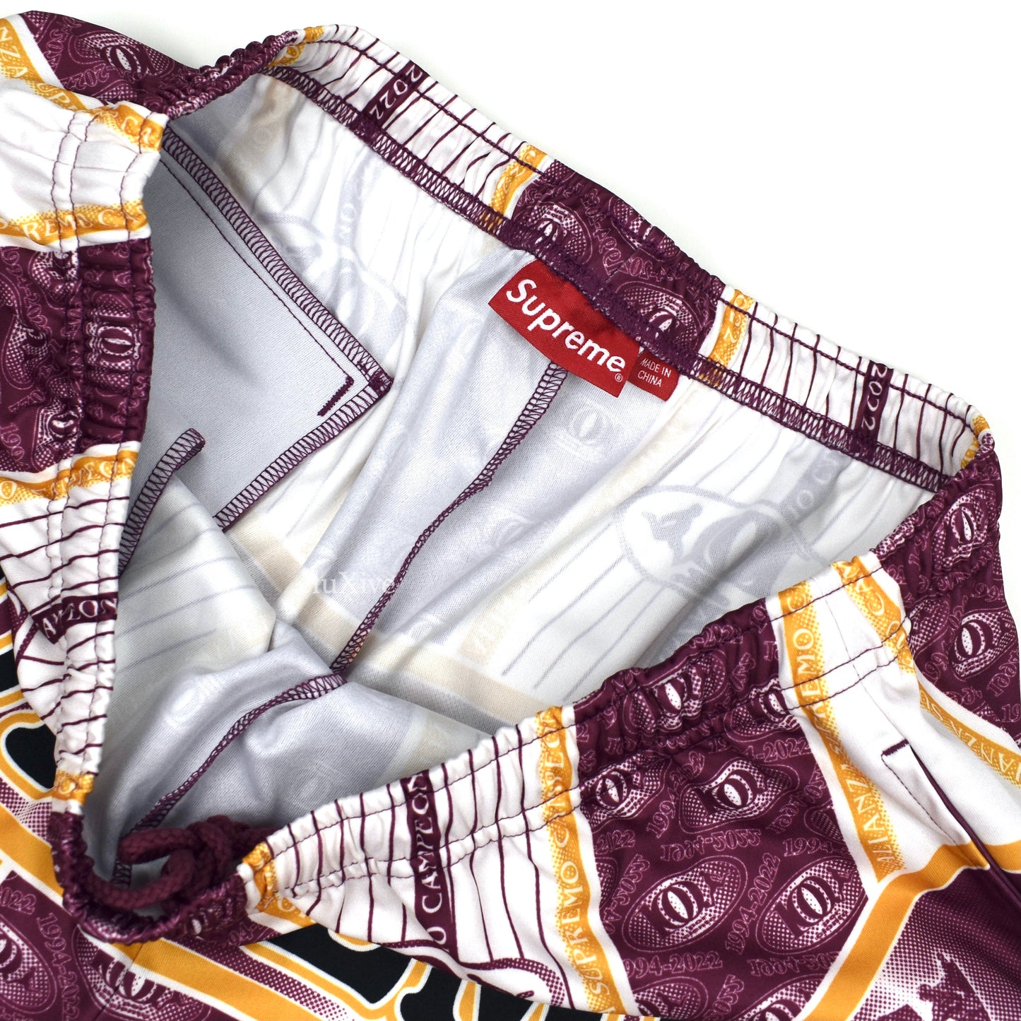 Supreme - Por Ciento Logo Print Soccer Shorts (Burgundy)