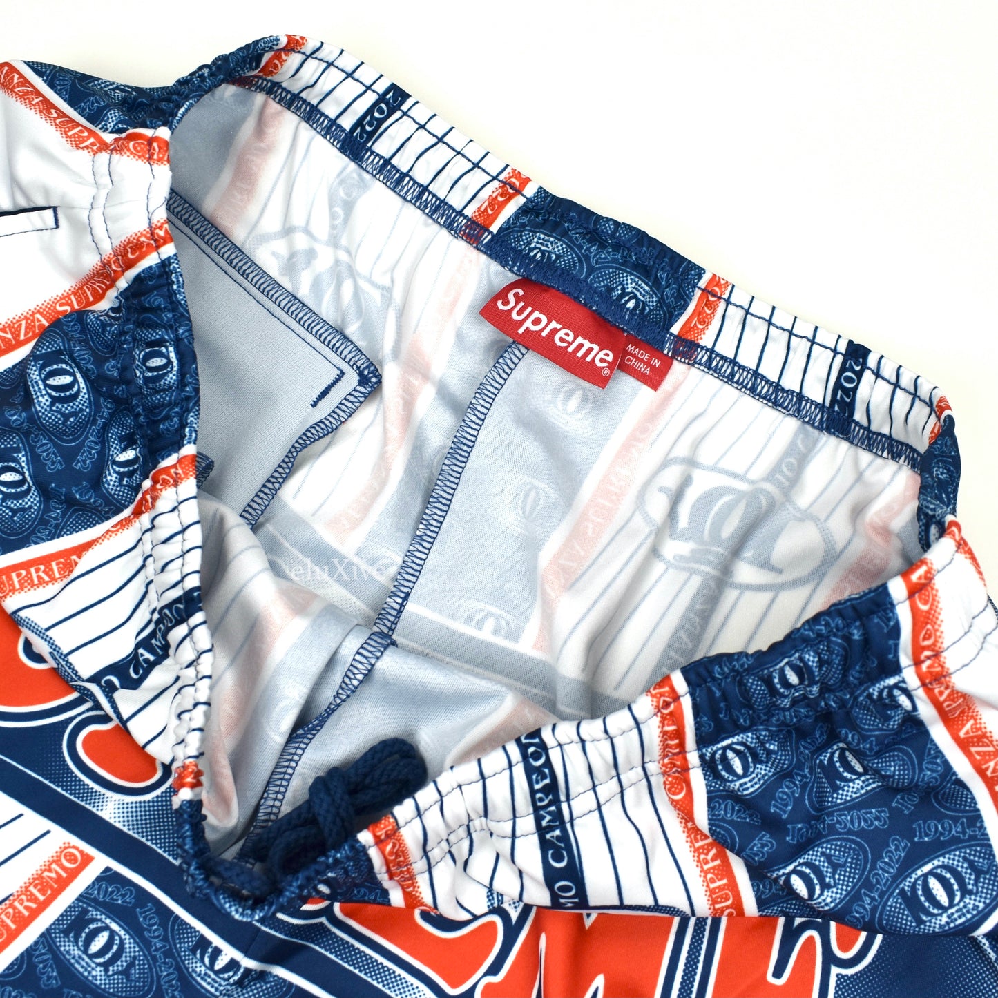 Supreme - Por Ciento Logo Print Soccer Shorts (Navy)