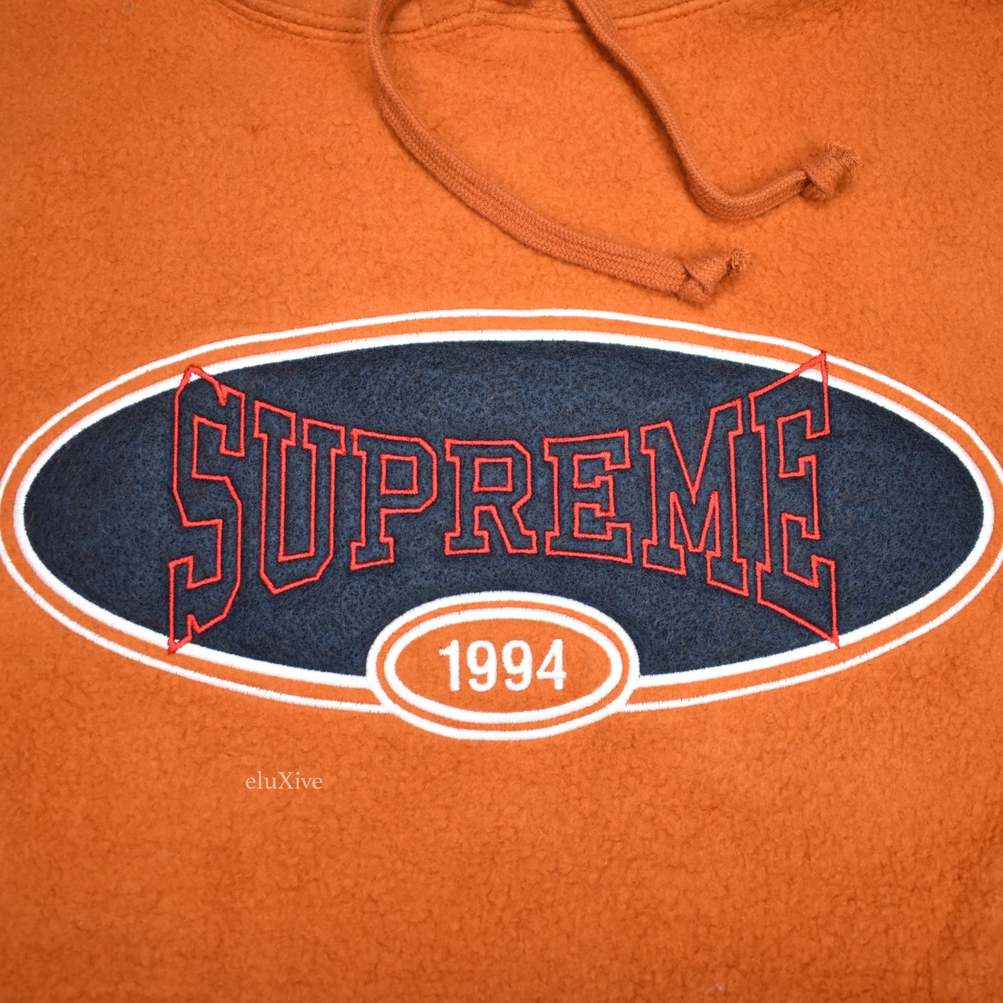 Supreme - Rust Reverse Fleece Logo Hoodie