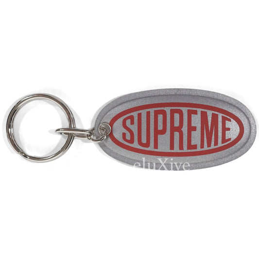 Supreme - Reflective Oval Logo Keychain